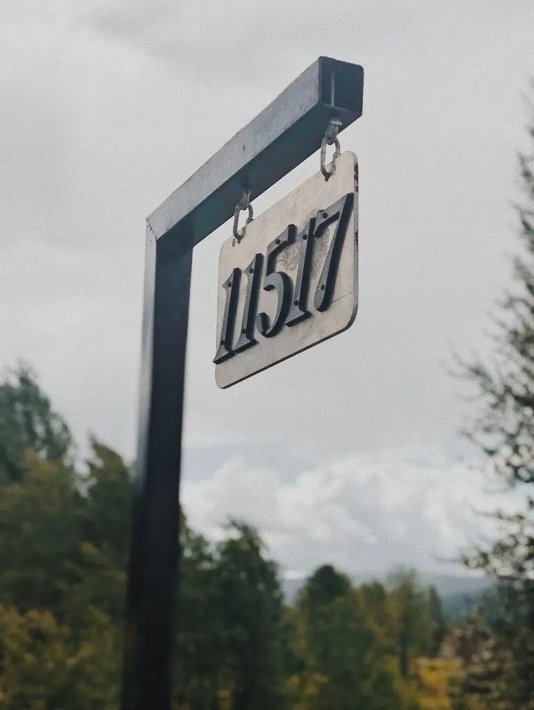 a sign with house numbers