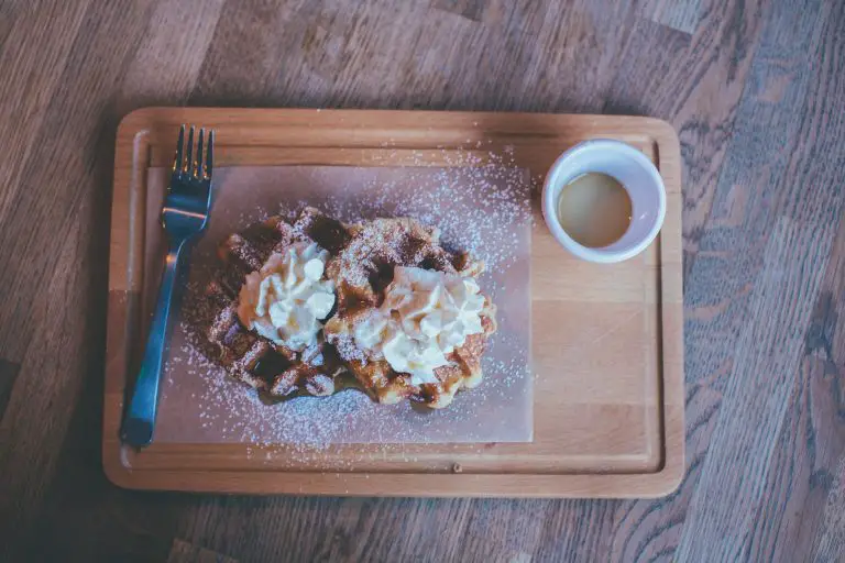 serving tray with drink, pastry and fork