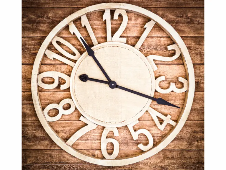 a wooden wall clock