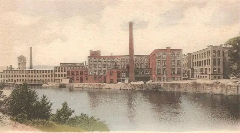 Starrett tools factory building in 1905 on river with smokestack