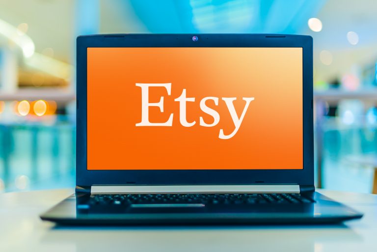 Laptop computer displaying logo of Etsy