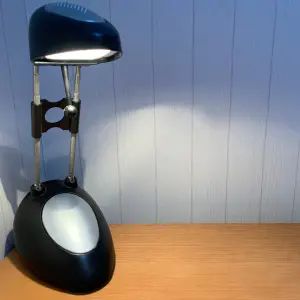 a desk lamp sitting on a desk