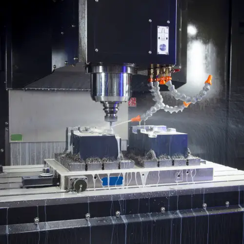 CNC with fixtures a cnc mill with multiple fixtures and coolant lines