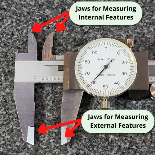 a dial caliper with the different jaw measuring faces identified